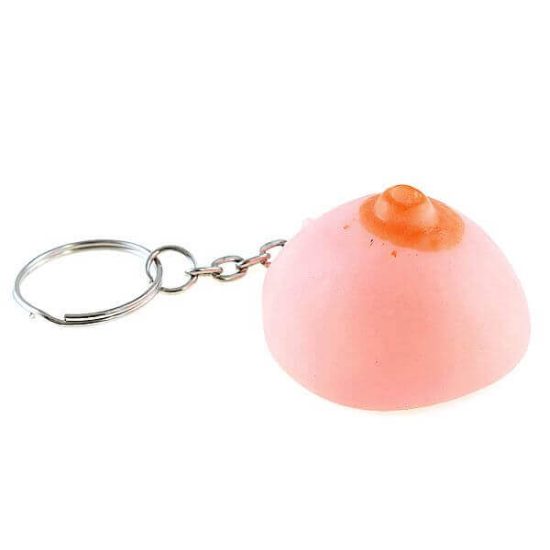 Chaveiro de Plástico Formato de Seio com Simulação de Leite Materno 9 x 3 cm